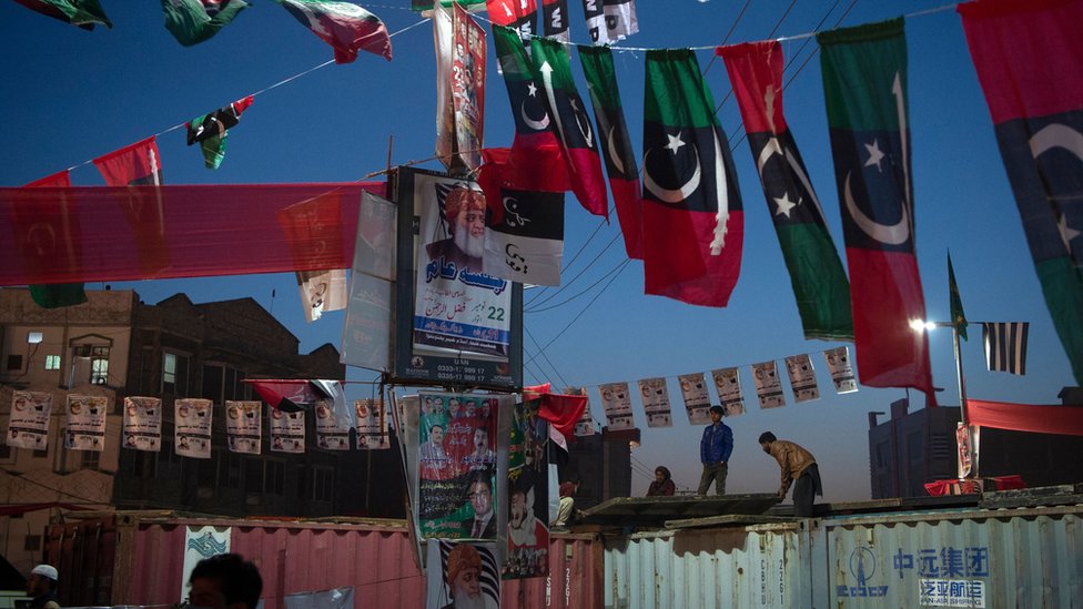 Workers decorate the venue for Pakistan Democratic Movement protest