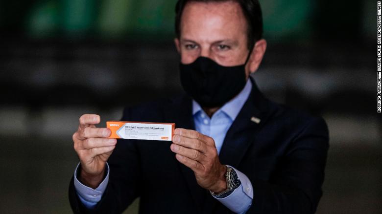 Sao Paulo Gov. Joao Doria holds a box of Sinovac's Coronavac vaccine during a news conference on November 19, 2020 in Sao Paulo, Brazil.